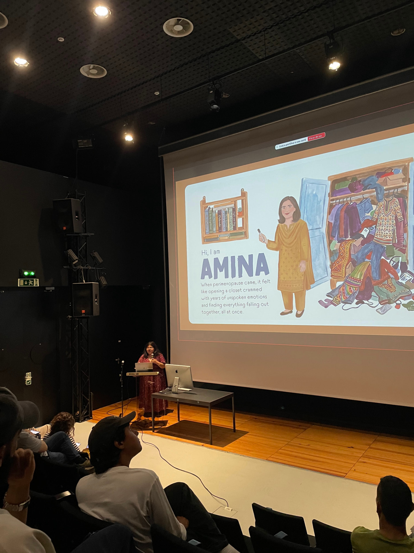 Presenting the Amina story at a public talk in Aveiro